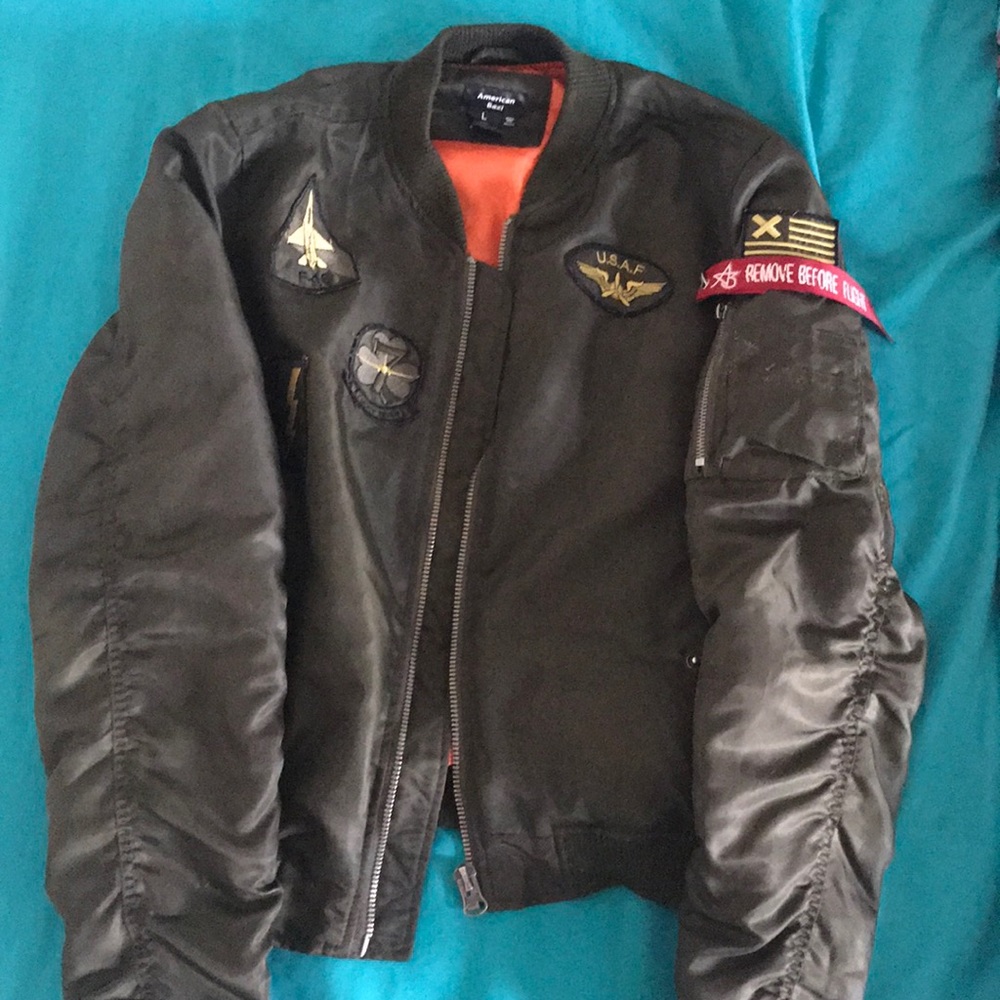 Navy green bomber jacket with orange interior
